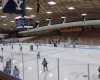 Yale and Clarkson WHKY players warming up on Yale's ice surface.